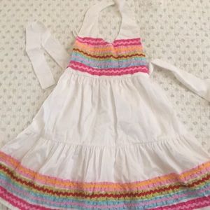White halter dress with multicolor ruffles